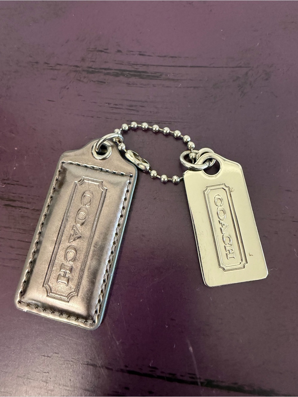 COACH Silver Metallic Leather and Metal Tag Keychain - Silver